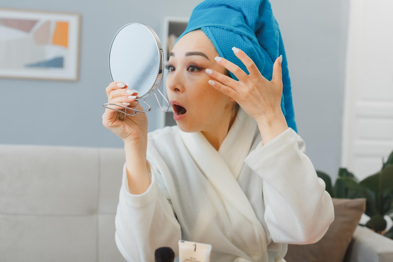 Woman Looking at Her Acne in the Mirror